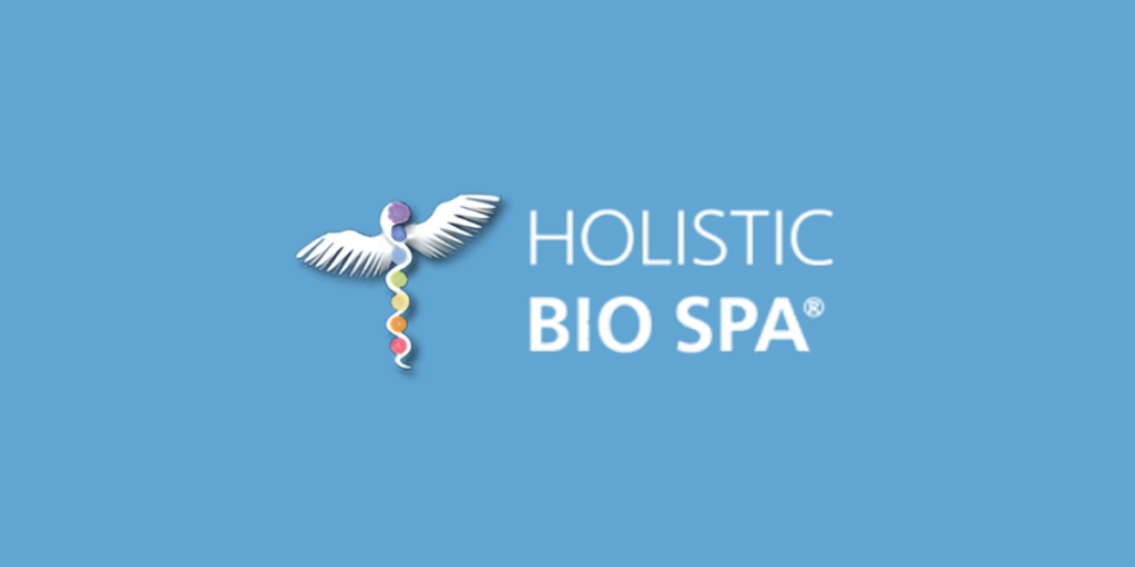 Logo of Holistic Bio Spa featuring a winged emblem and colorful spiral design