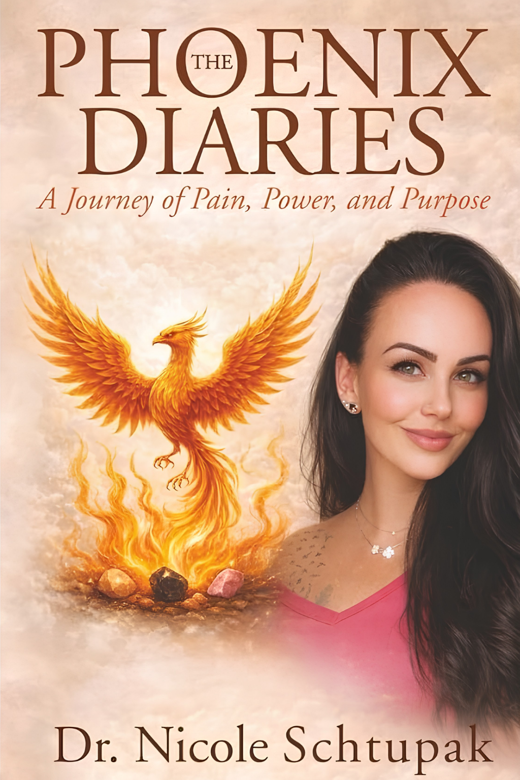 Book cover featuring a phoenix rising from flames and a woman's portrait