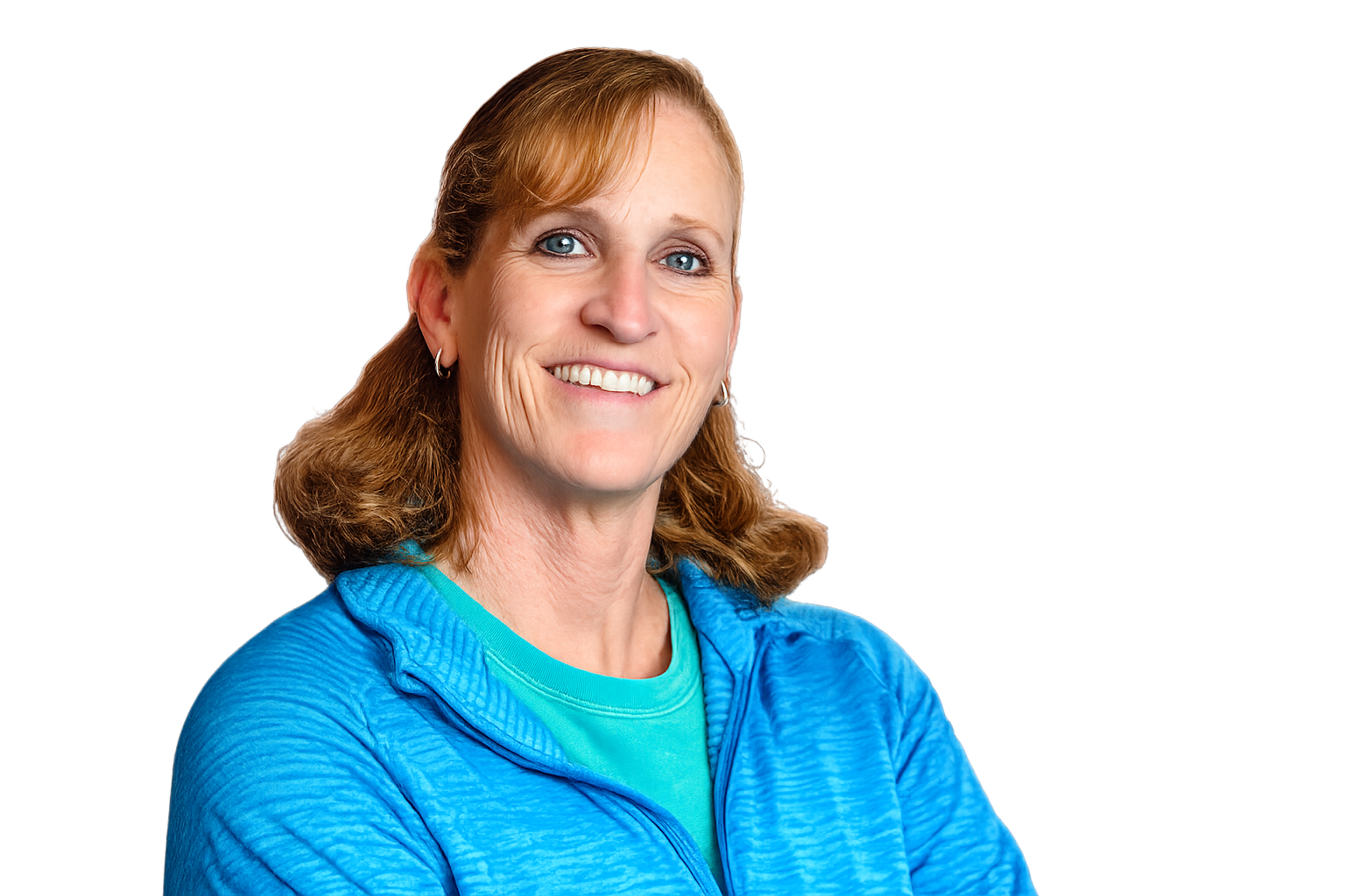 Smiling woman with shoulder-length hair wearing a blue jacket against a black background