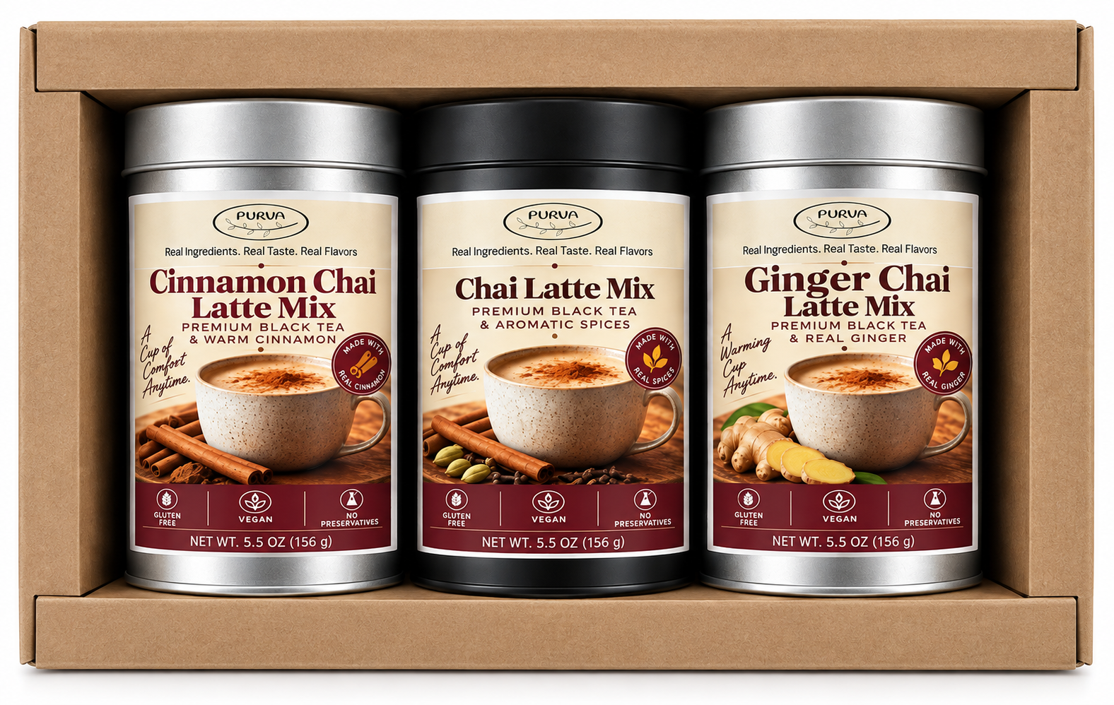Three cans of chai latte mixes in a box, featuring cinnamon and ginger flavors