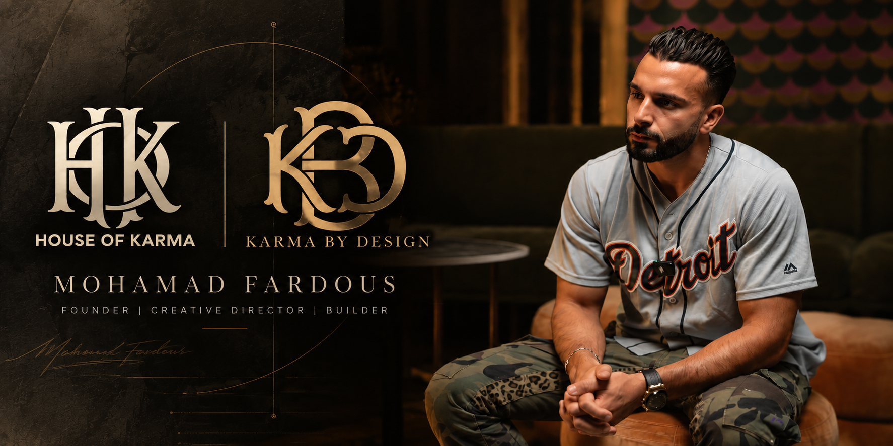 Man sitting in a stylish interior, wearing a Detroit baseball jersey and camo pants