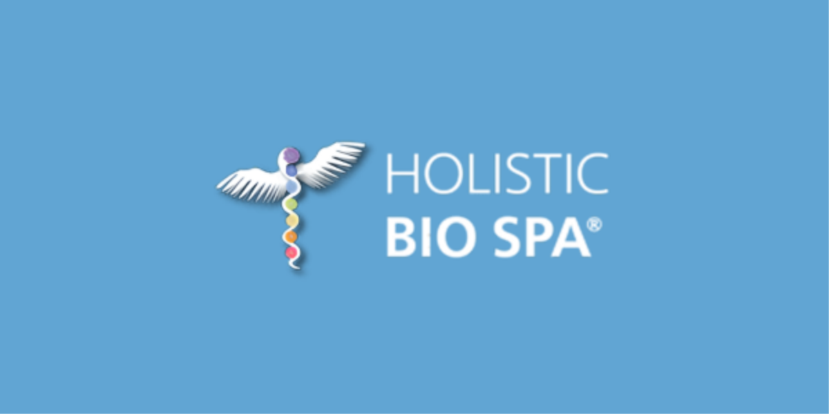 Logo of Holistic Bio Spa with a caduceus and colorful elements on a blue background