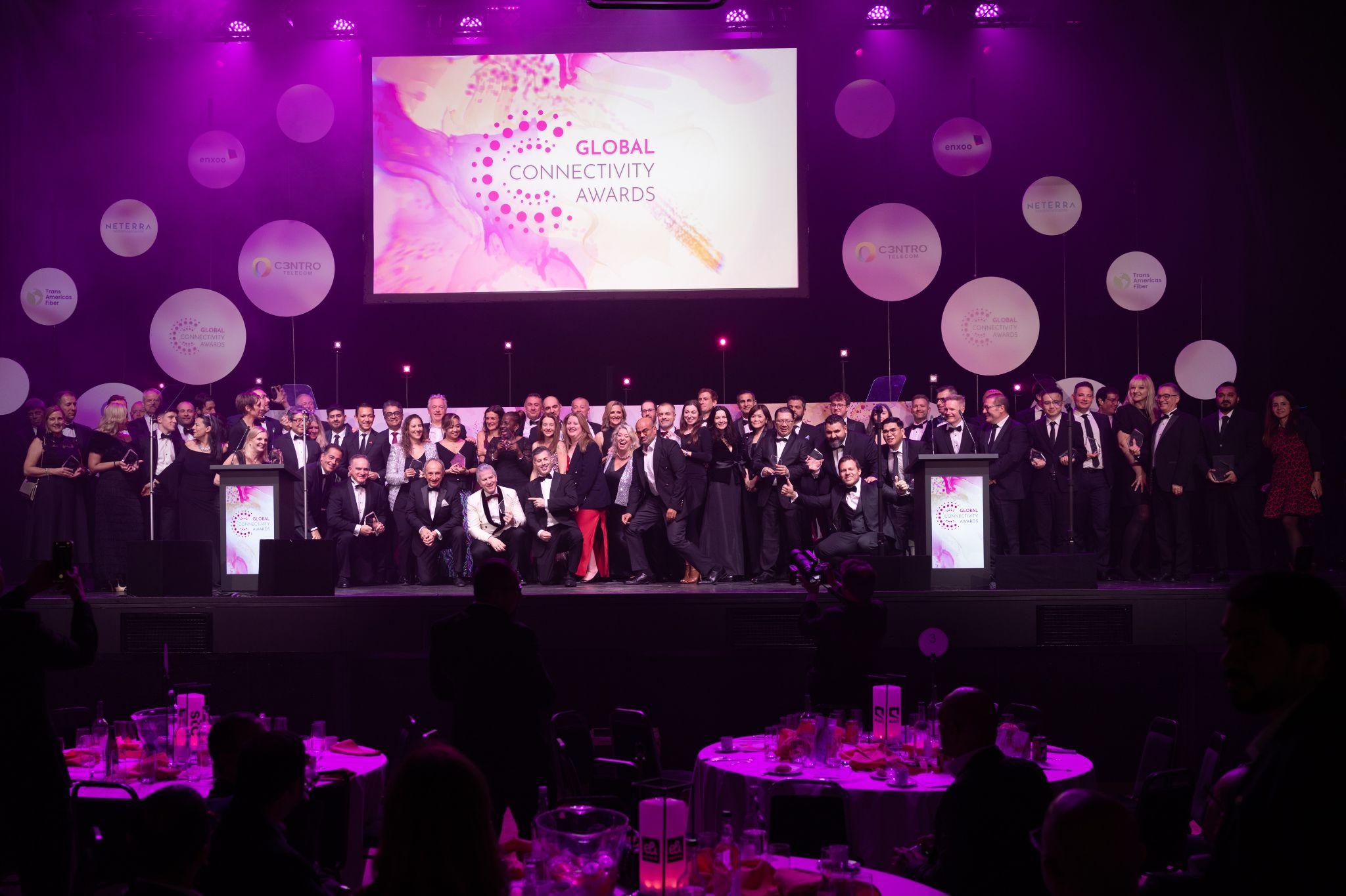 Group photo of award winners and attendees at the Global Connectivity Awards event