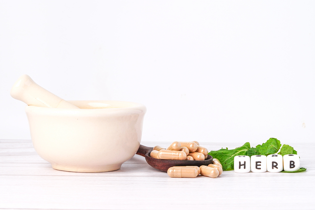 small-alternative-medicine-herbal-organic-capsule-with-herbs-leaf-natural-supplements-for-healthy-good-life-9e848e7f.jpg